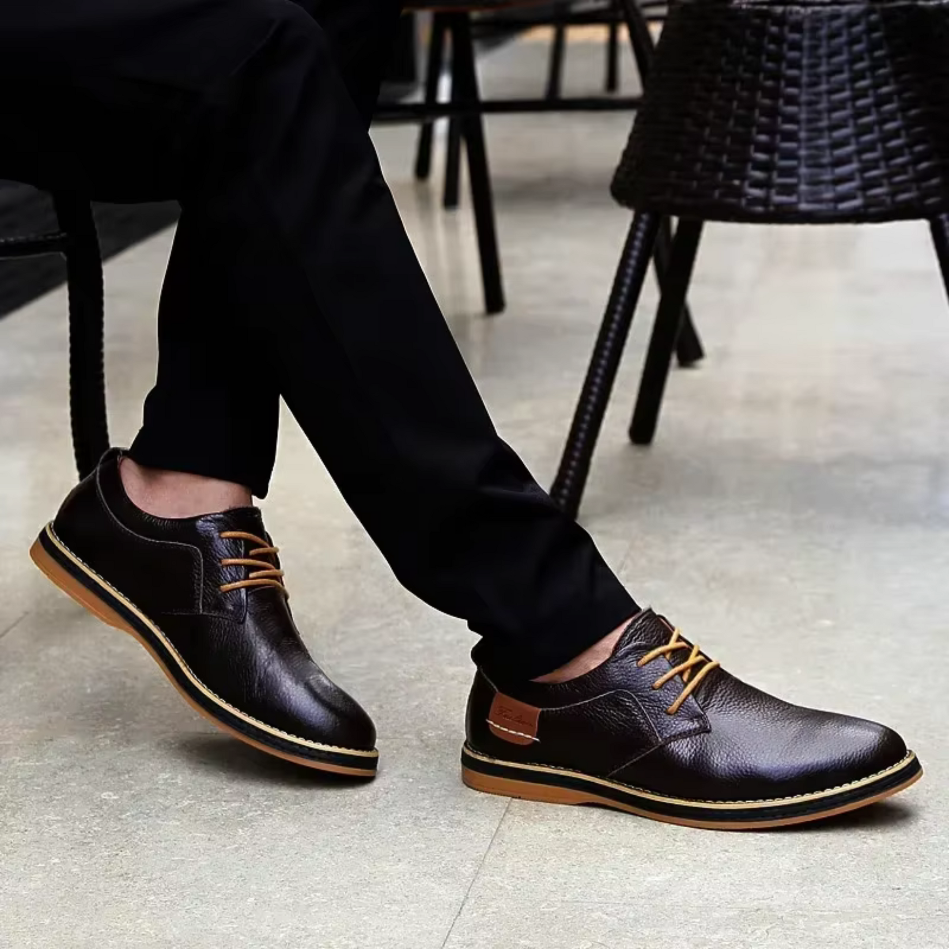 Men's genuine leather moccasins in dark brown with tan laces, stylish and casual design for versatile outfits.